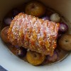 Rolled Pork Shoulder with Apples, Onions and Perfect Pork Crackling (a welcome to the UK feast)